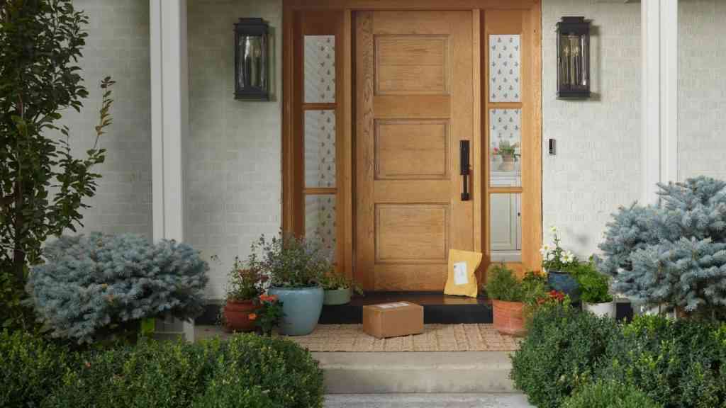 View of packages on front porch by door